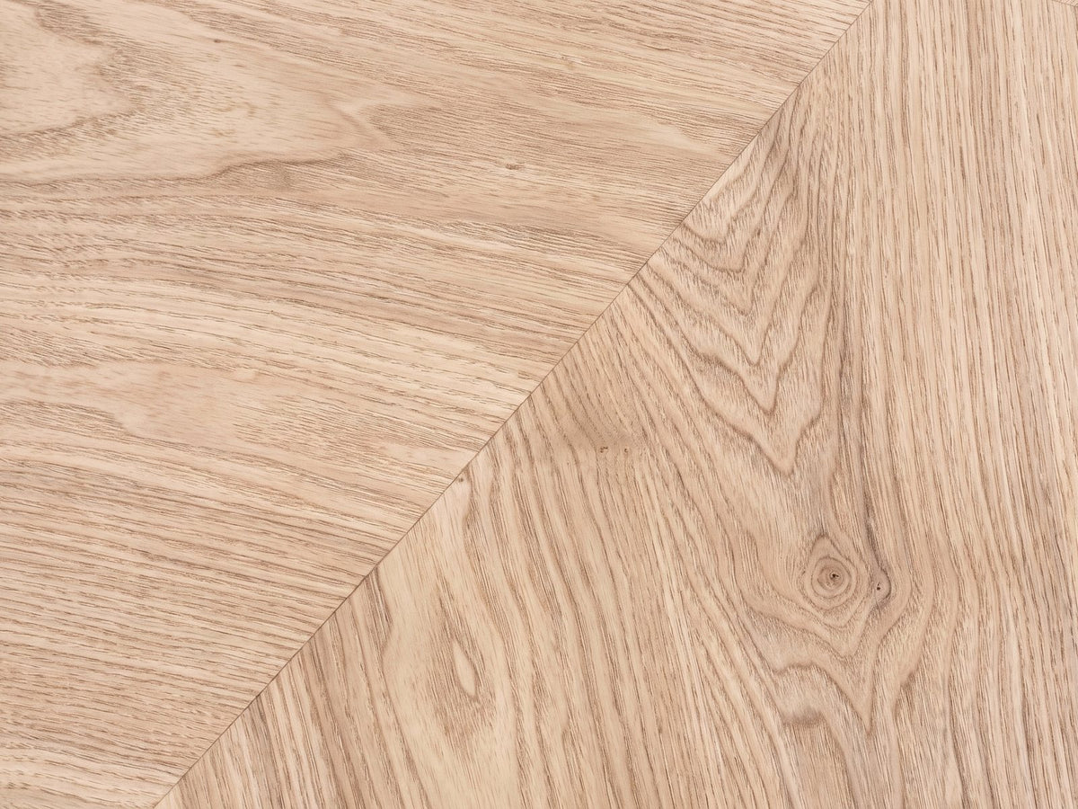 Close-up of the Alba 31.5-Inch Round Parquet Wood Veneer Storage Coffee Table: the radial parquet veneer of the lid