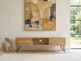 Alberobello Low Mango Media Console under a large abstract painting in a bright living room