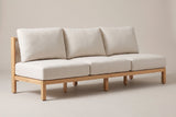 The Alcamo armless acacia outdoor sofa with off-white cushions and a beige rope back, three-quarter view on a light studio backdrop