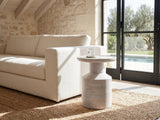 Aliano Whitewashed Mango Tray-Top Side Table beside a linen sofa in a poolside villa
