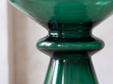 Close-up of the Alliste Blown Glass Hourglass Side Table: the collar and ring at the waist of the blown glass