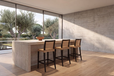 Altilia Open-Weave Rattan and Mahogany Counter Stool in a sunlit villa dining room