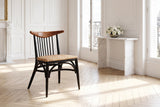 Amendolara Spindle-Back Mahogany and Rattan Dining Chair in a Paris salon