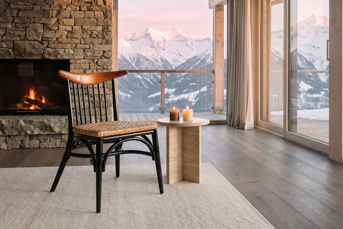 Amendolara Spindle-Back Mahogany and Rattan Dining Chair in an alpine chalet