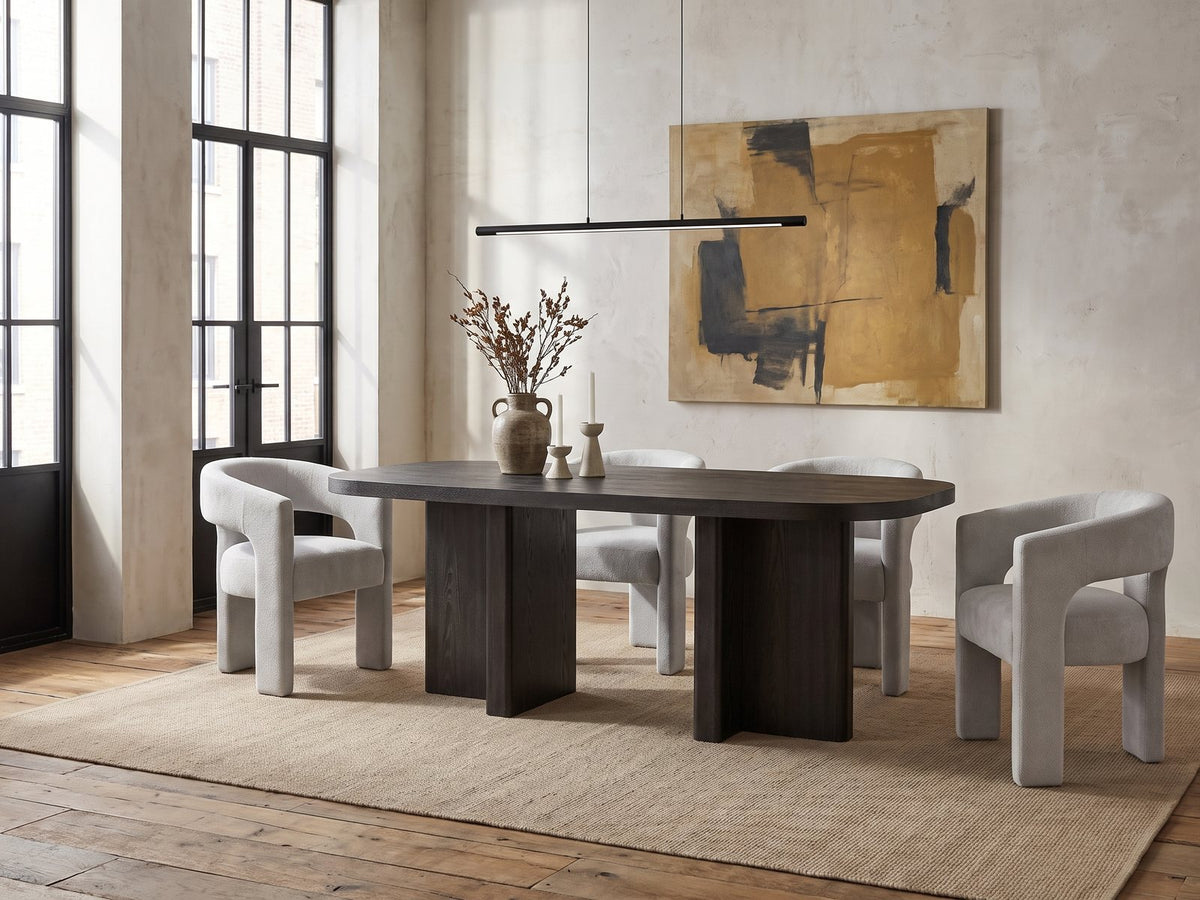 Anticoli 78-Inch Ebony Oak Pedestal Dining Set with 4 Boucle Armchairs in an industrial loft dining area
