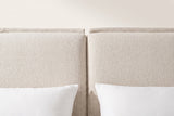 The top of the two Anversa headboard panels where they meet: the narrow gap, the small notch and the flat flanges along the top