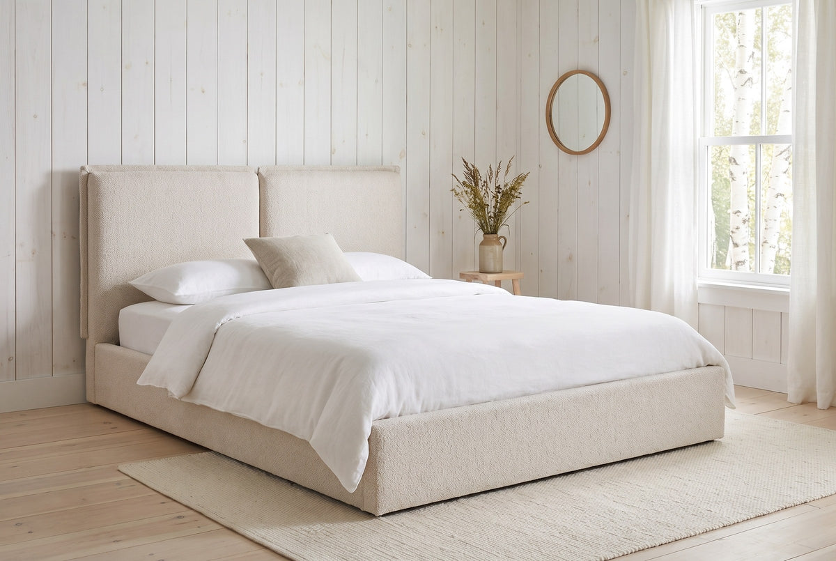 Anversa bed against whitewashed pine boards in a Hudson Valley farmhouse bedroom