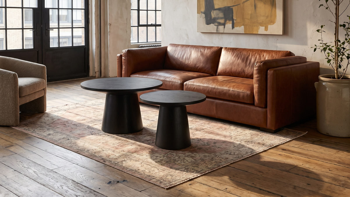 Dark wood, soft light. - Acqui 29-Inch Round Ebony Oak Veneer Pedestal Coffee and End Table Set