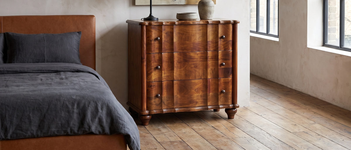 Chestnut curves, plaster walls. - Adria 34-Inch Chestnut Solid Mango 3-Drawer Chest