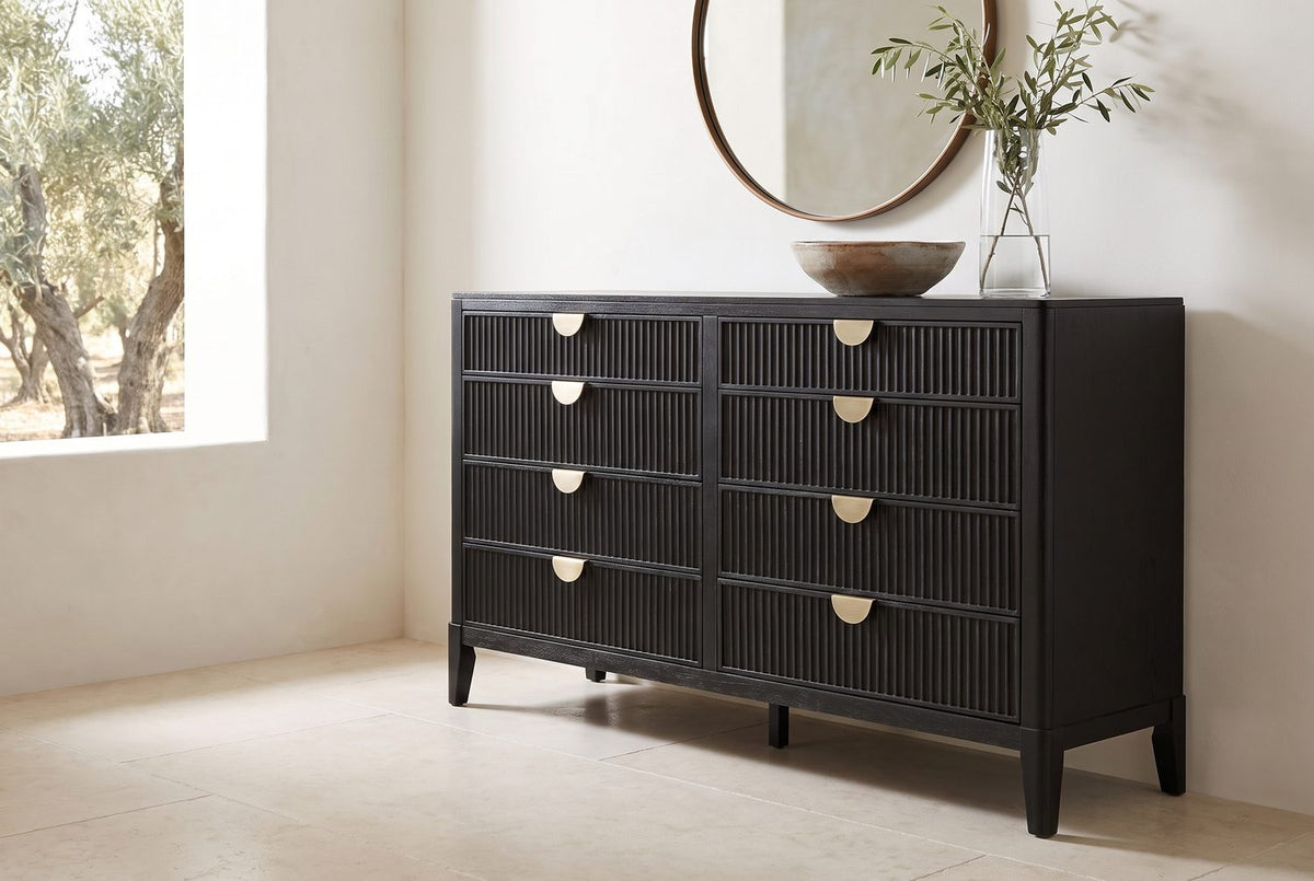 Matte black, warm metal. - Agordo 66-Inch Black Fluted 8-Drawer Dresser