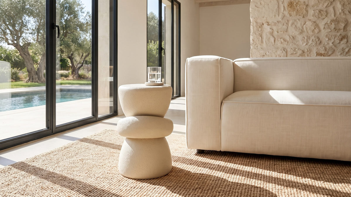 Soft shapes, warm cream. - Altomonte Cream Fiberglass Stacked Side Table