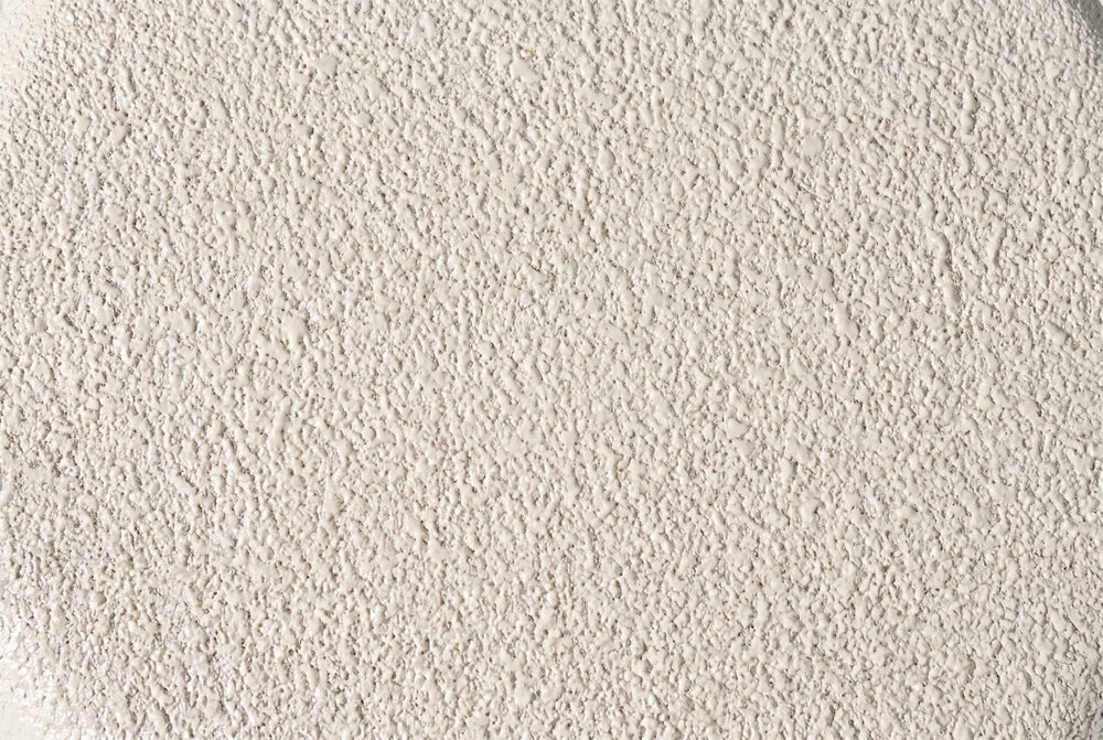 Cream, with a sandy texture