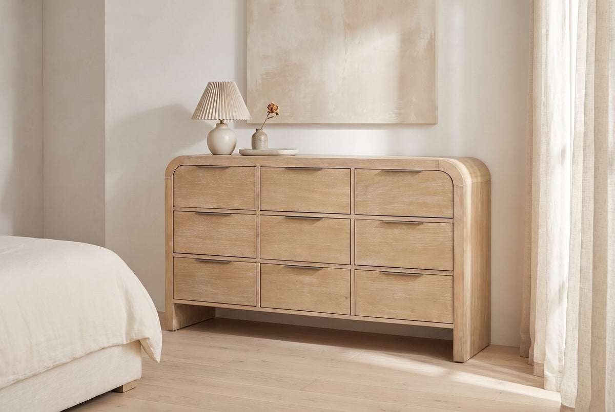 Rounded ends, open floor. - Aquileia 63-Inch Natural Mango 9-Drawer Dresser