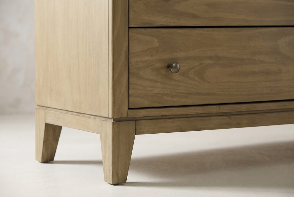 A trim, tapered leg
