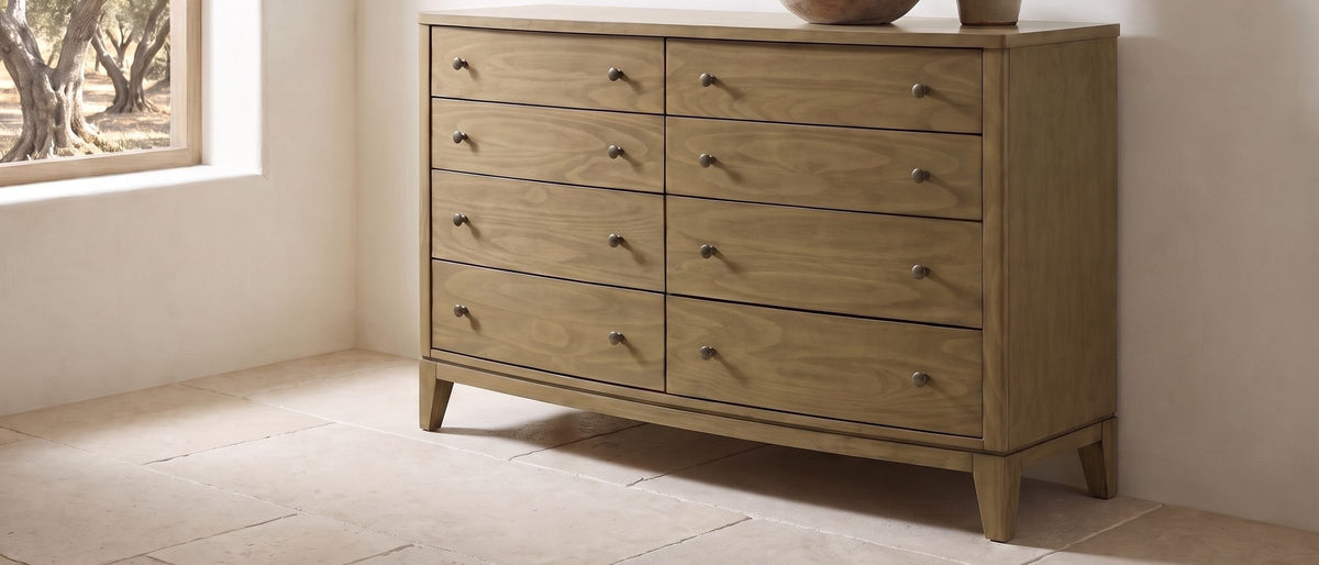 Arqua 61-Inch Natural Pine 8-Drawer Dresser in the room