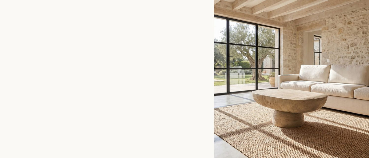A pebble, set on a pedestal. - Asiago Faux Travertine Oval Mushroom Coffee Table