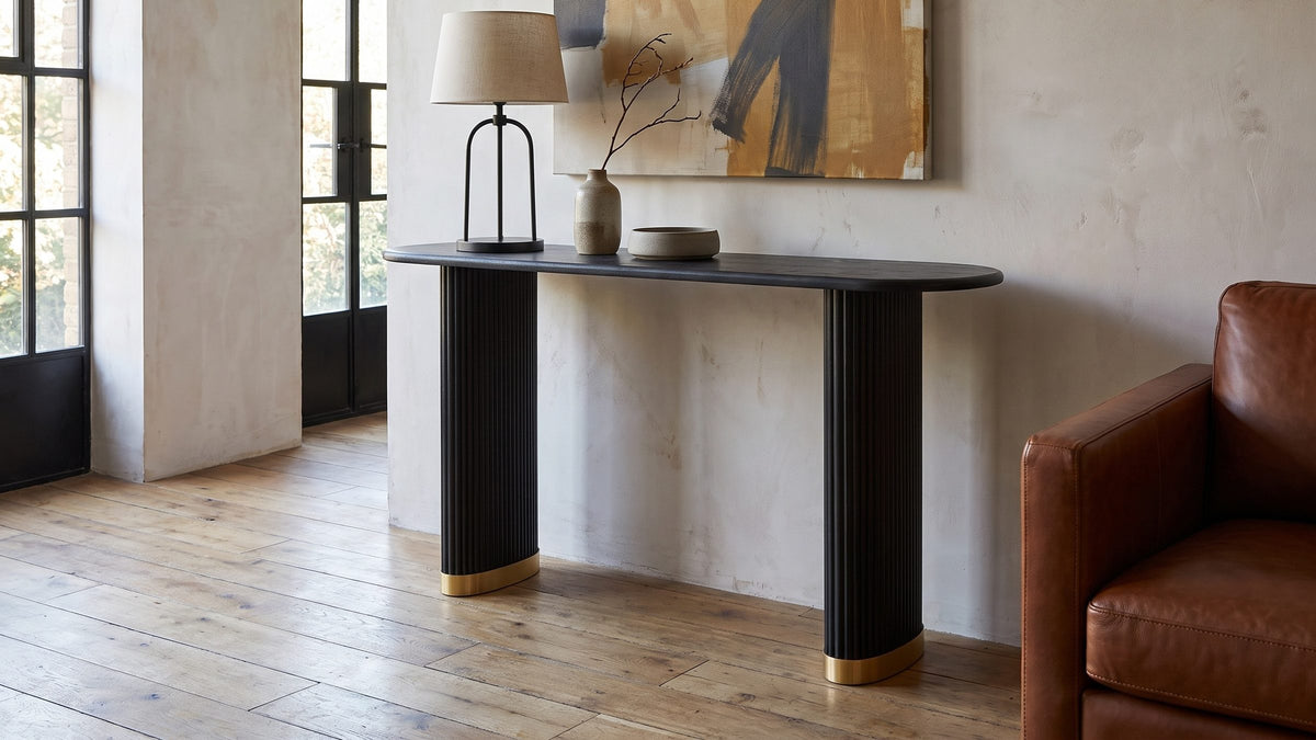 A dark line, lifted on gold. - Atina Black Ash Oval Console Table