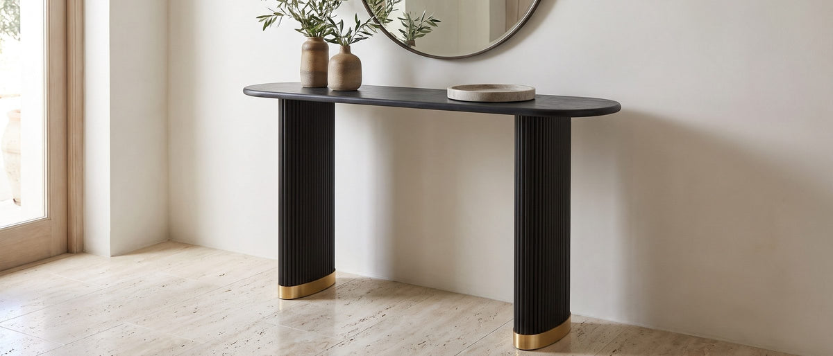 Atina Black Ash Oval Console Table in the room