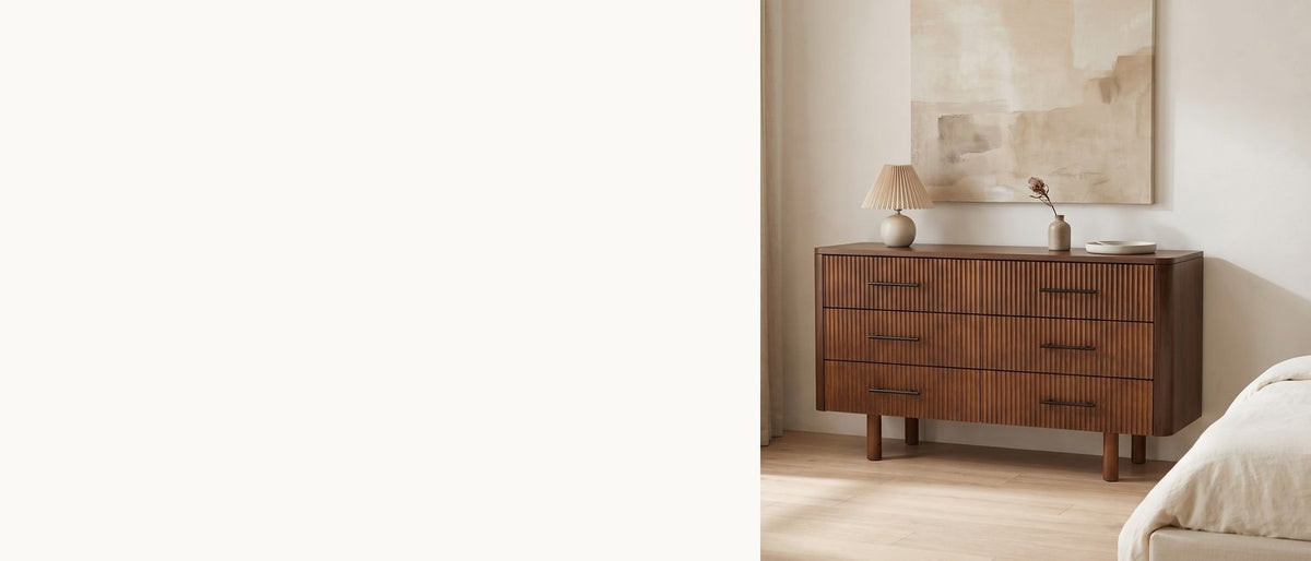 Reeded fronts, rounded ends. - Badia 56-Inch Walnut-Finish 6-Drawer Dresser
