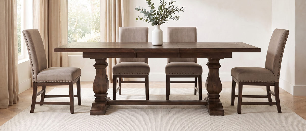 Bagnara 76.5 to 94.5-Inch Rustic Oak Double Pedestal Dining Set with 4 Chairs in the room