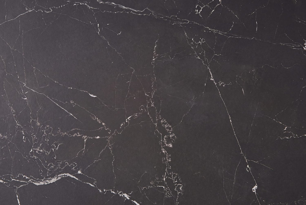 White veins on black