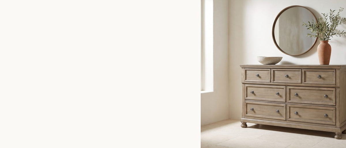 Weathered gray, country lines. - Bassano 65-Inch Wire-Brushed Driftwood Gray 7-Drawer Dresser