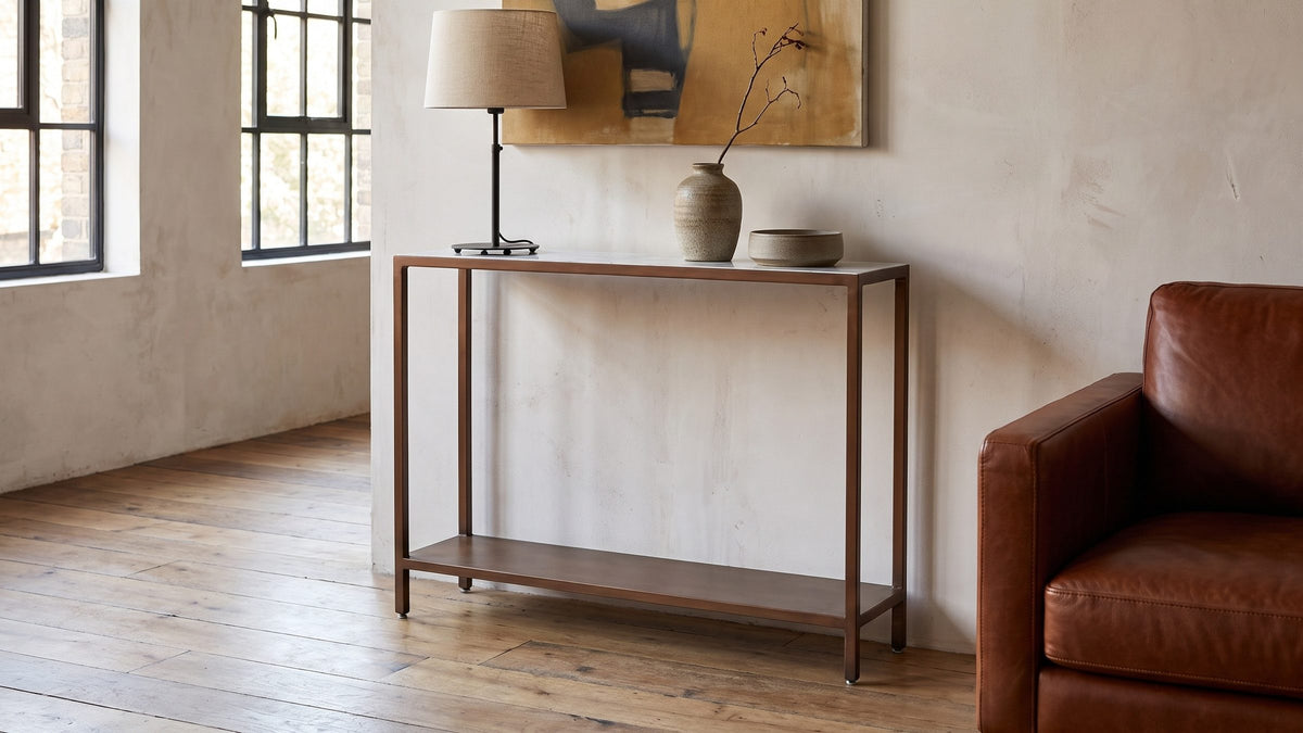Light on its feet. - Bellegra White Marble Console Table