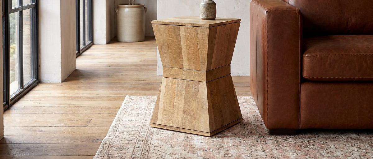 Belmonte Mango Wood Hourglass Side Table in the room