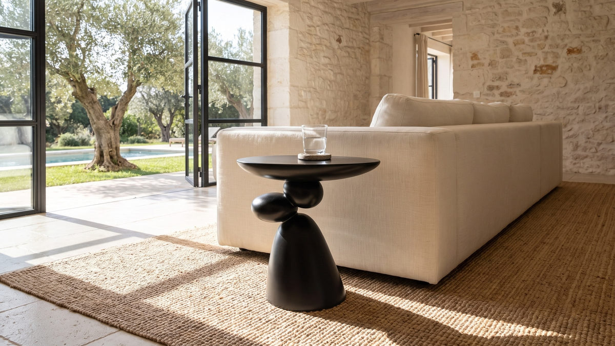 One dark shape, softly balanced. - Bitetto Black Fiberglass Stacked Pebble Side Table