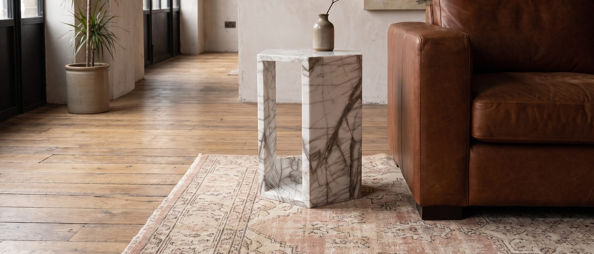 Bovino White Marble Hexagon Side Table in the room