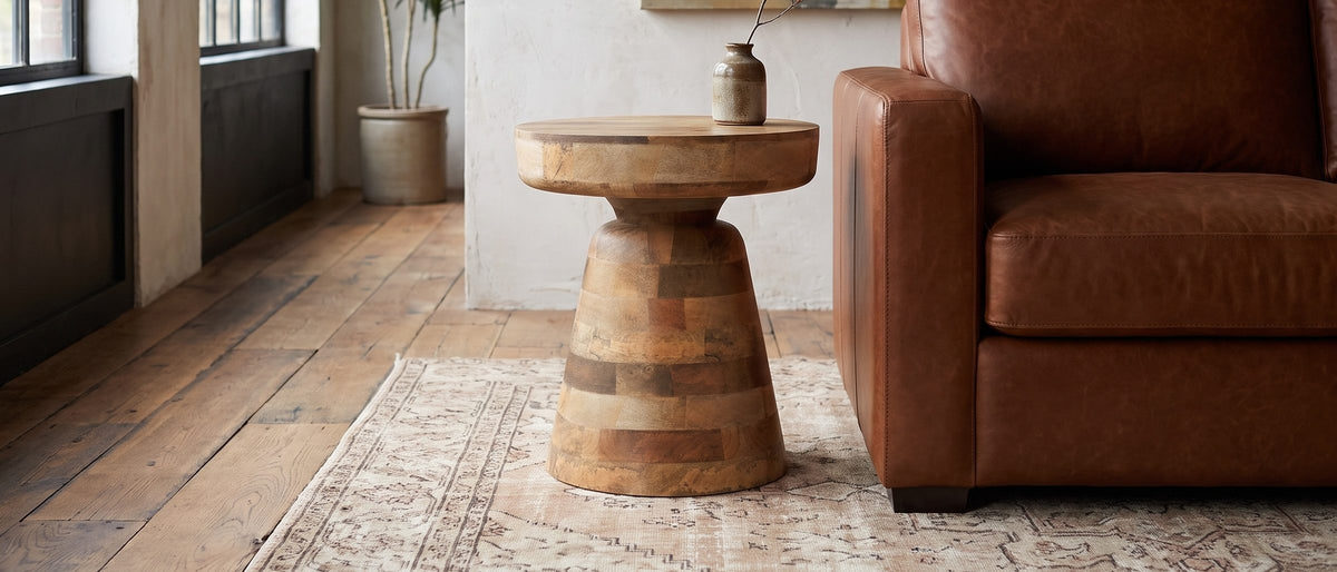 Bronte Solid Mango Pedestal Side Table in the room