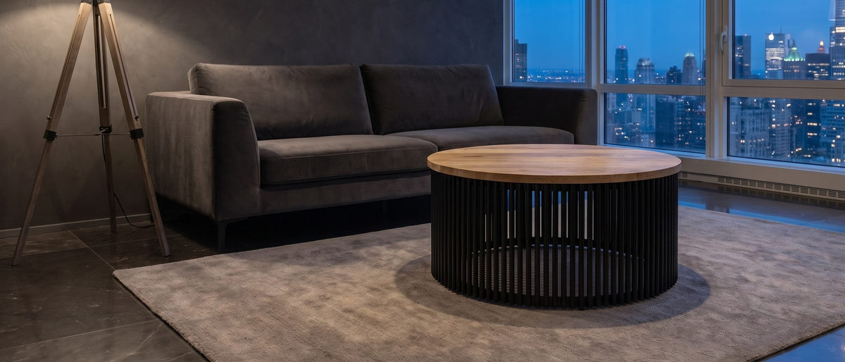 Camogli Mango and Black Metal Drum Coffee Table in the room