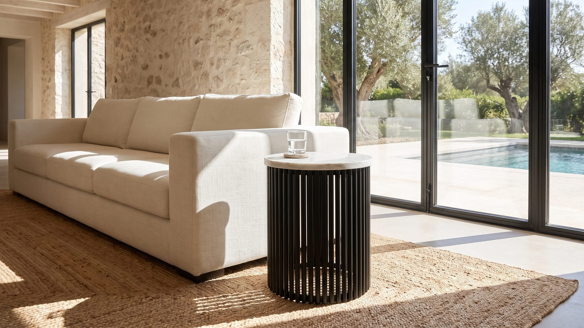 Black and white, beside the sofa. - Camogli Marble and Black Metal Drum Side Table