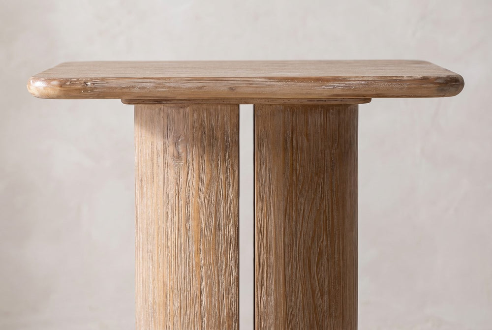 A slot through the pillar