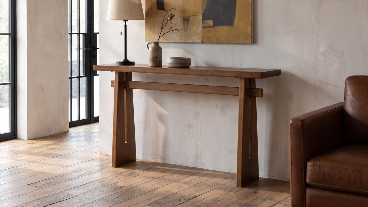 A beam, two legs, one line. - Capurso Wood Veneer Trestle Console Table