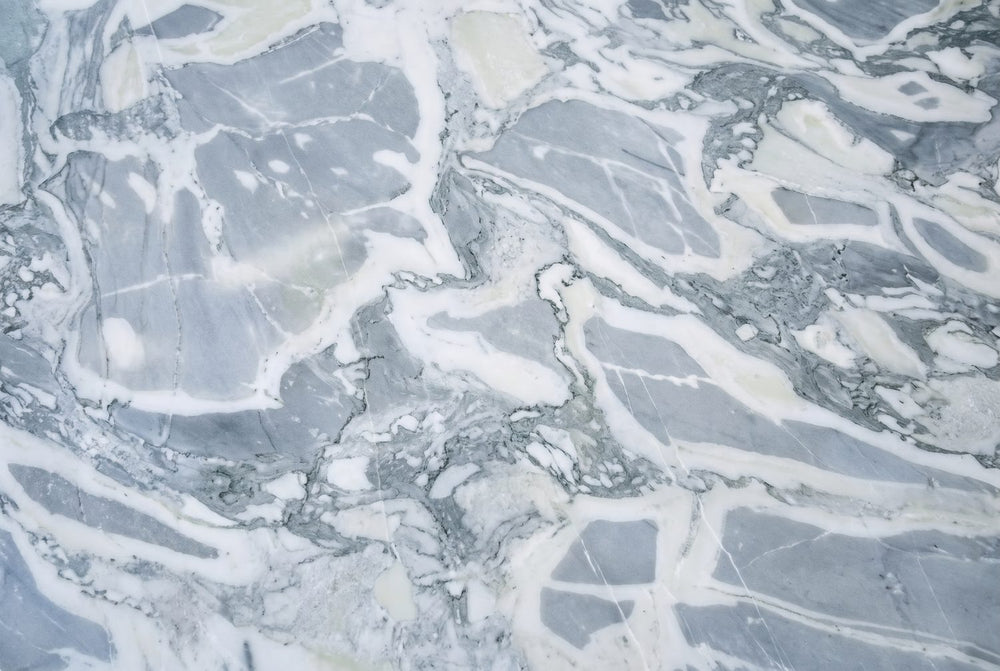 Grey-blue, veined in white