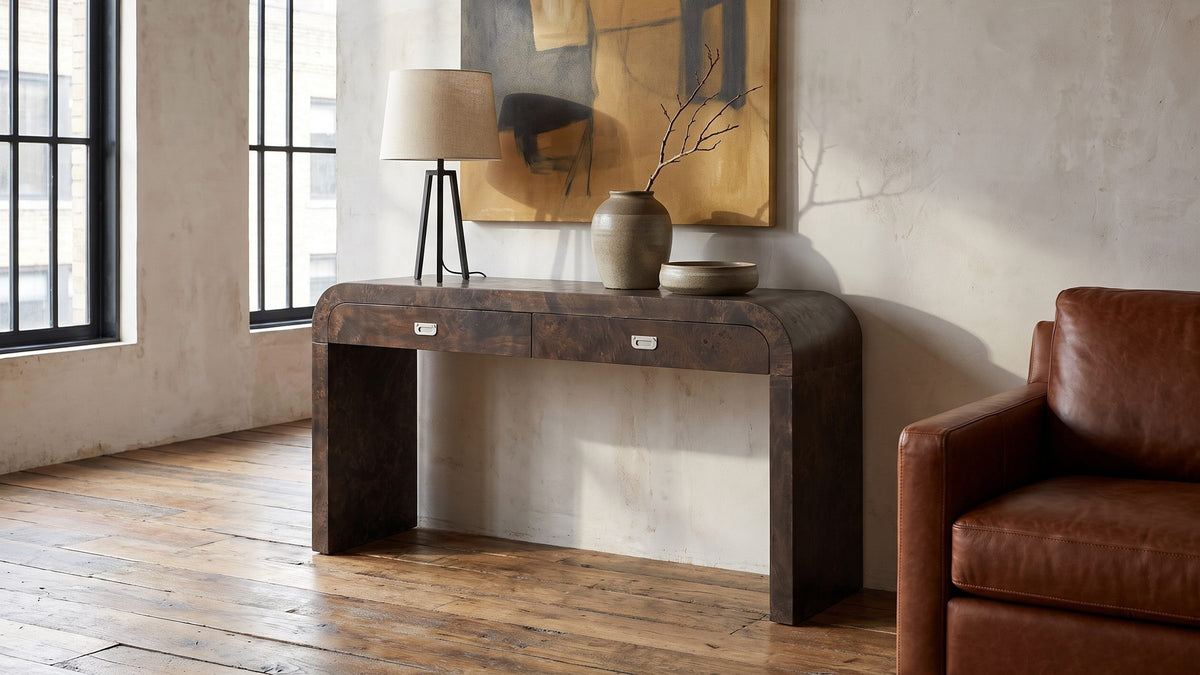 A dark curve against the wall. - Castellana Burl Veneer Waterfall Console Table