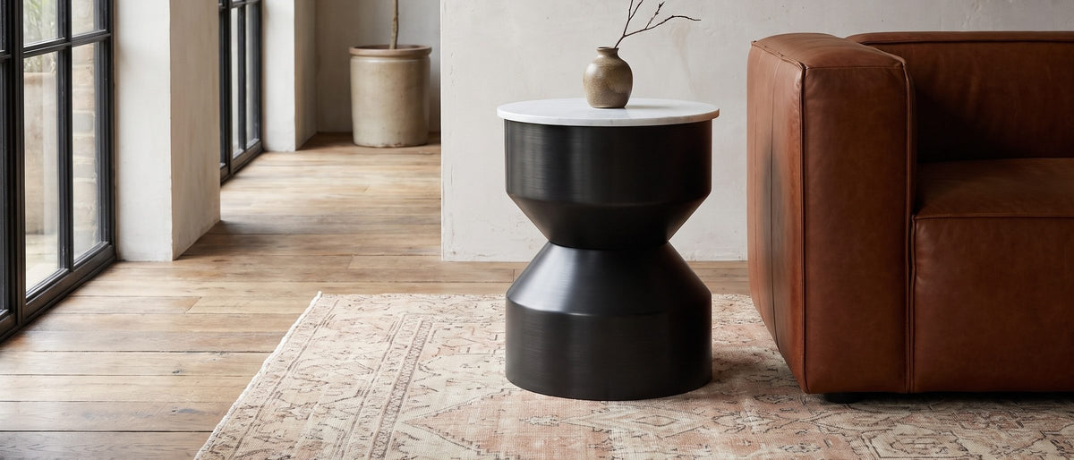 Ceglie White Marble Hourglass Side Table in the room
