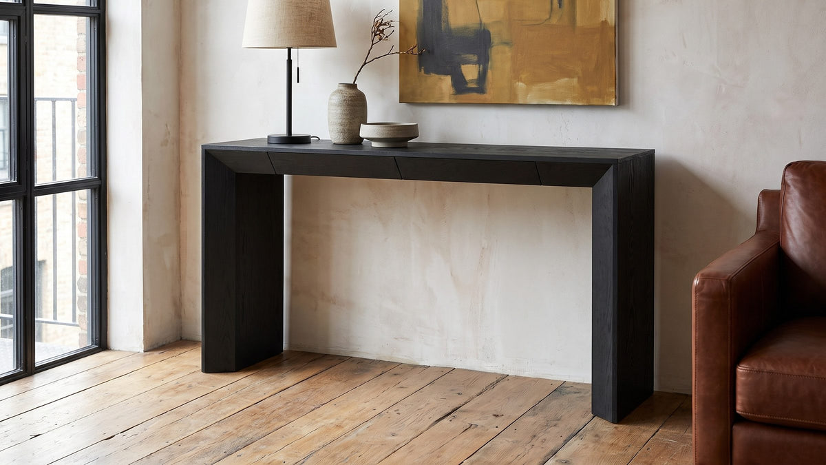 One black line, two drawers. - Cellamare Black Ash Veneer Waterfall Console Table