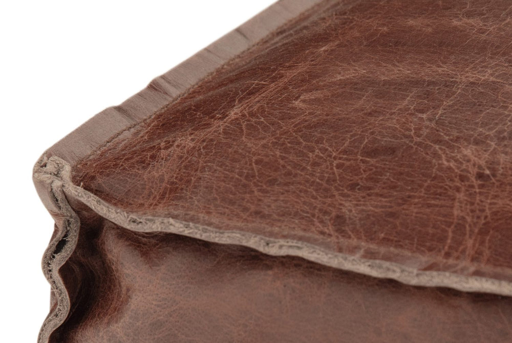 A raw-cut leather lip