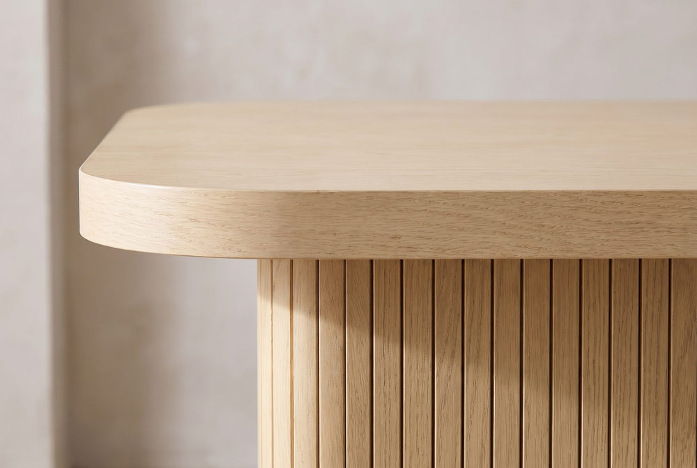Fluted, then rounded