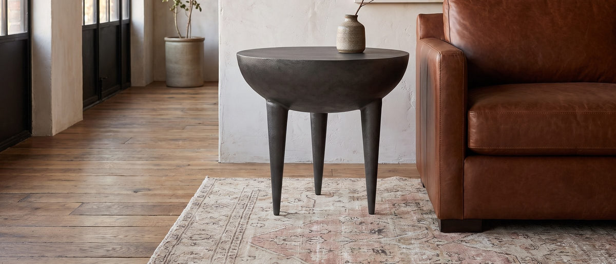 Colledara Cast Aluminum Bowl Side Table in the room