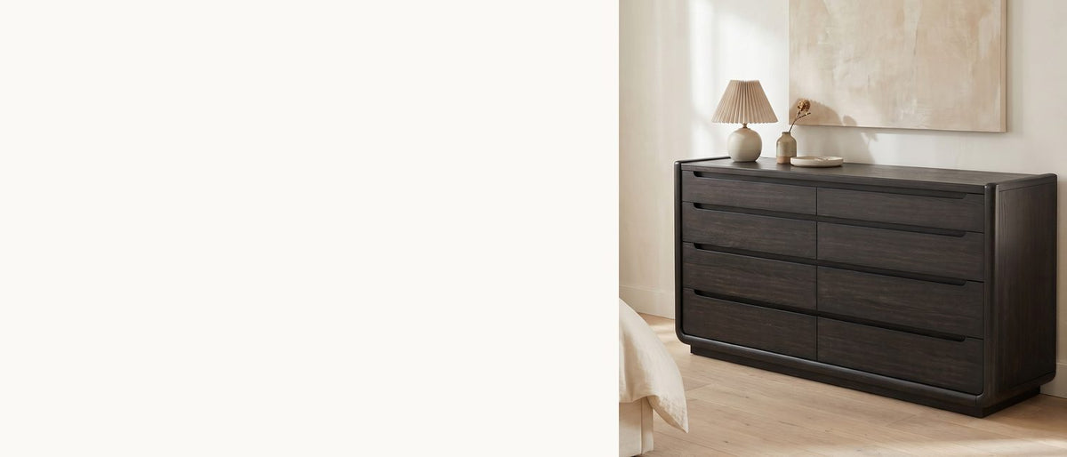 Burnished ash, carved to open. - Conegliano 66-Inch Burnished Black 8-Drawer Dresser