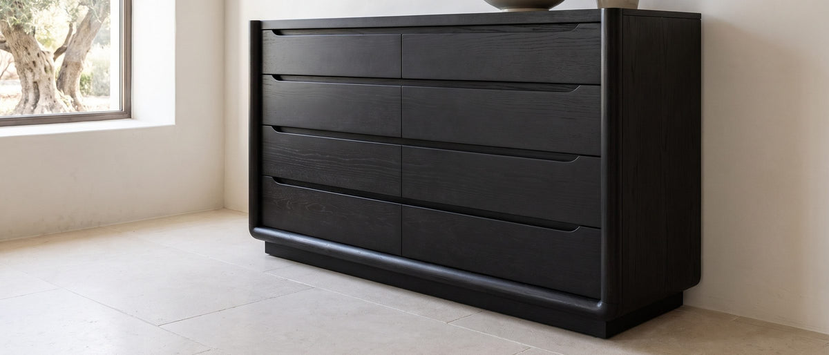 Conegliano 66-Inch Burnished Black 8-Drawer Dresser in the room