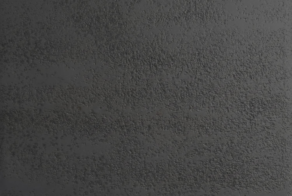 Cast, lightly textured