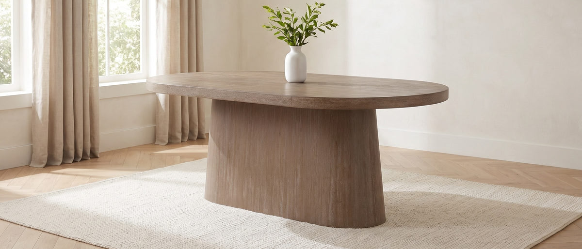 Cotronei 84-Inch Oval Cocoa Wood Veneer Pedestal Dining Table in the room