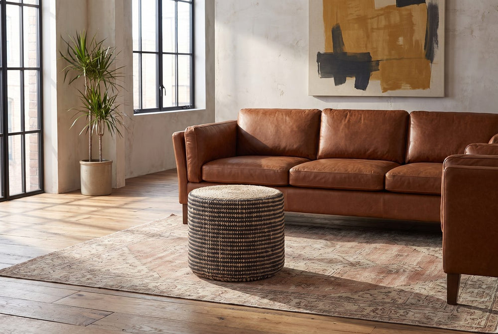 In front of cognac leather