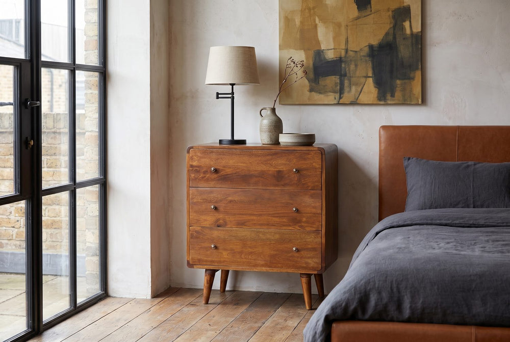 Beside a bed or a window