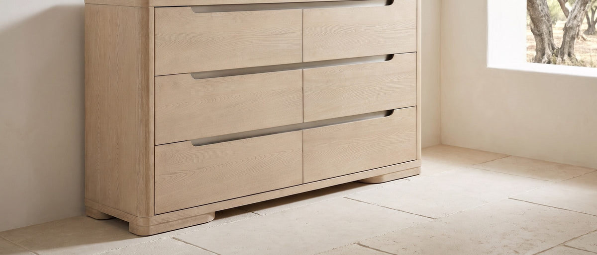 Este 66-Inch Light Elm 6-Drawer Dresser in the room