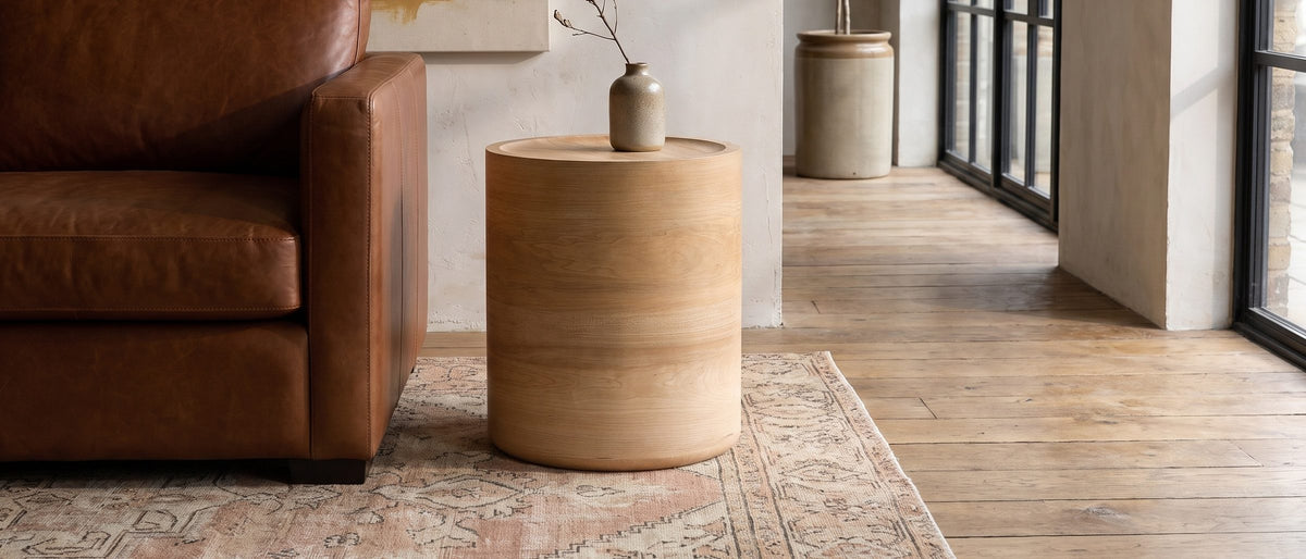 Ferrandina Natural Wood Veneer Drum Side Table in the room